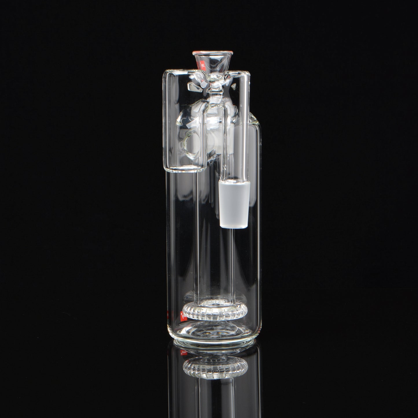 Splashcatcher for a bong standing straight up on a black background