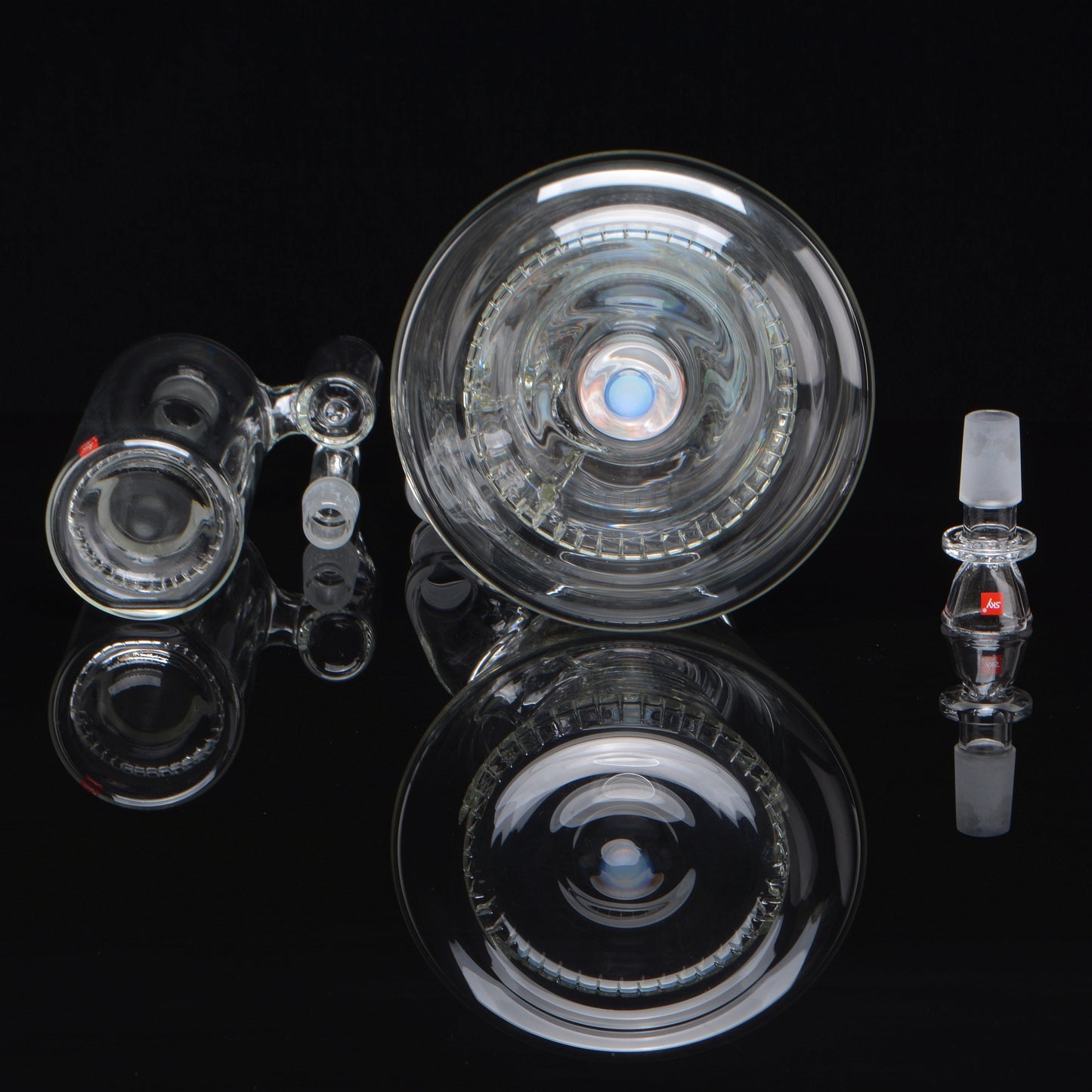 Reflective base, ashcatcher, and bowl shot