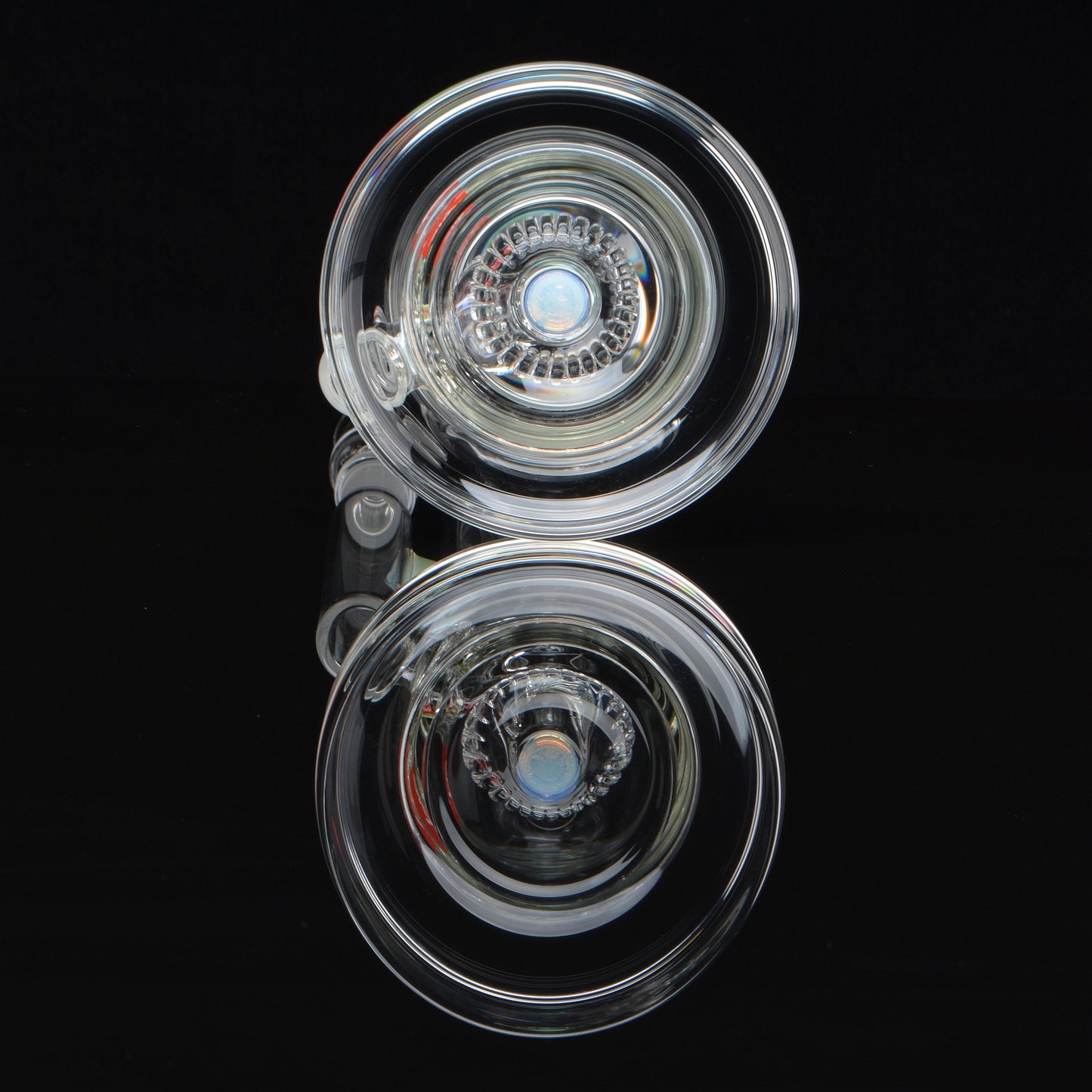 Reflective shot of the base of the Eclipse bong