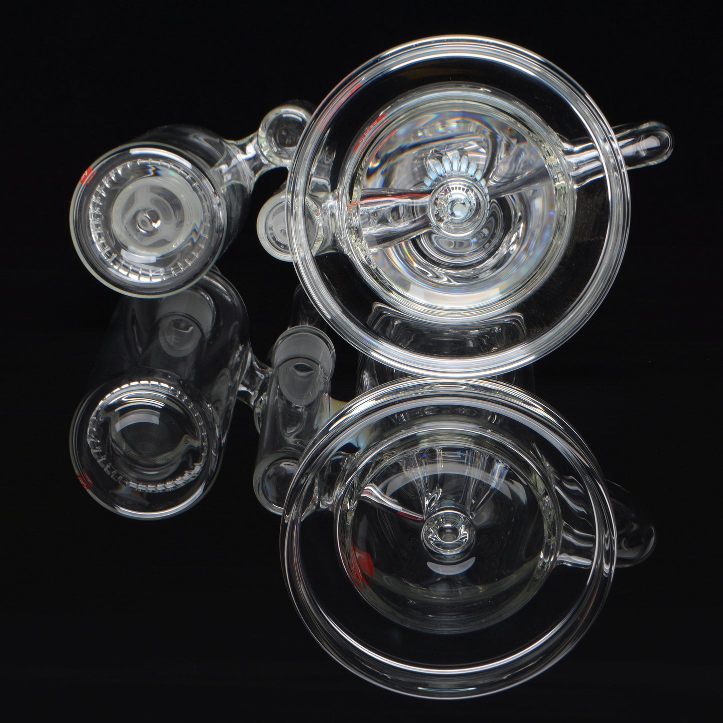 Reflective base and showerhead splash catcher shot