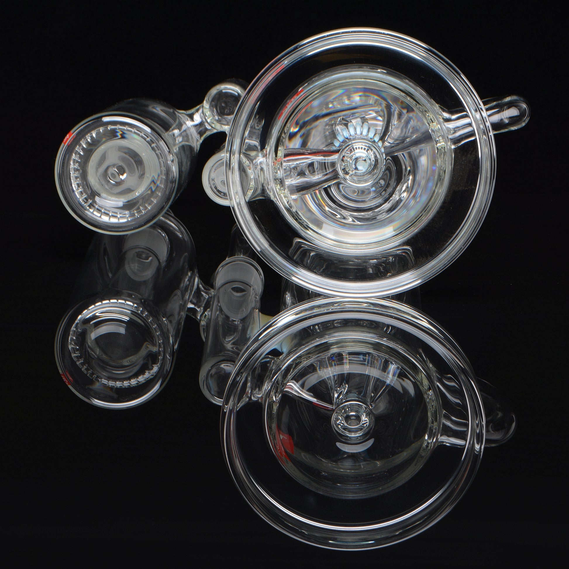Reflective base and showerhead splash catcher shot