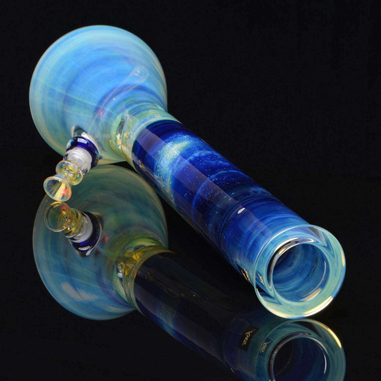 Venus 18in beaker bong, laying down, rotated 45 degrees, mouthpiece shot